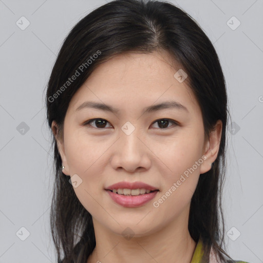 Joyful asian young-adult female with medium  brown hair and brown eyes