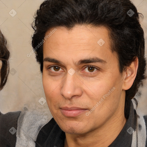 Joyful white adult male with medium  brown hair and brown eyes