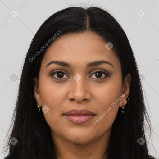 Joyful latino young-adult female with long  brown hair and brown eyes