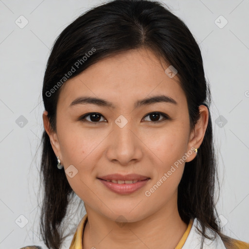 Joyful latino young-adult female with medium  brown hair and brown eyes