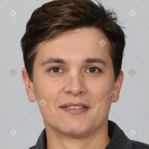 Joyful white adult male with short  brown hair and brown eyes