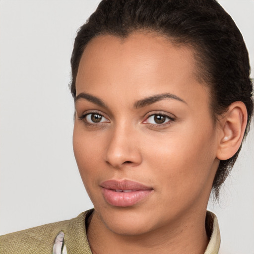 Neutral white young-adult female with short  brown hair and brown eyes