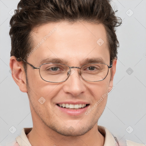 Joyful white adult male with short  brown hair and grey eyes