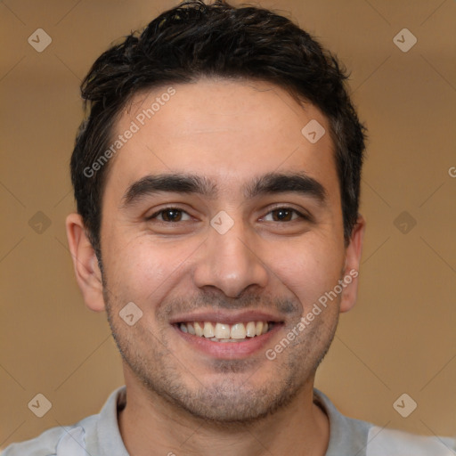 Joyful white young-adult male with short  black hair and brown eyes