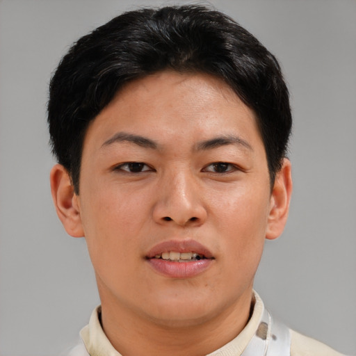 Joyful asian adult female with short  brown hair and brown eyes