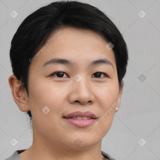 Joyful asian young-adult female with short  black hair and brown eyes