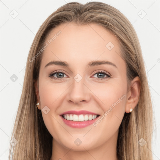 Joyful white young-adult female with long  brown hair and grey eyes