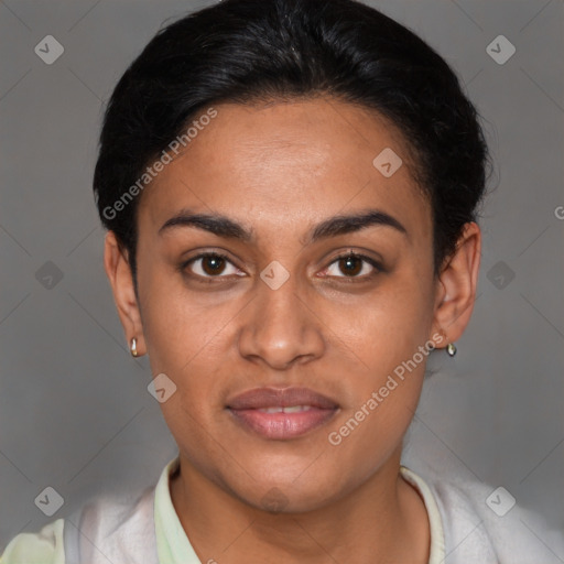 Joyful latino young-adult female with short  black hair and brown eyes