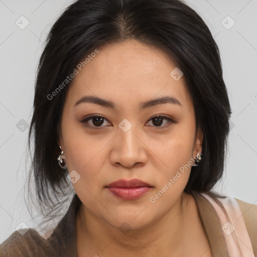 Joyful asian young-adult female with medium  brown hair and brown eyes