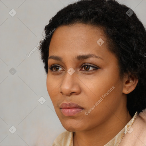 Neutral black young-adult female with short  black hair and brown eyes