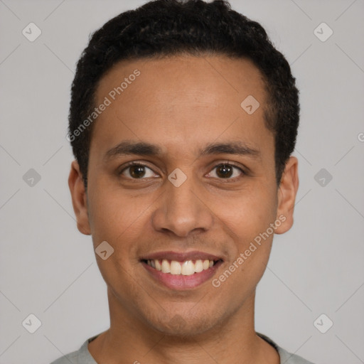 Joyful latino young-adult male with short  black hair and brown eyes