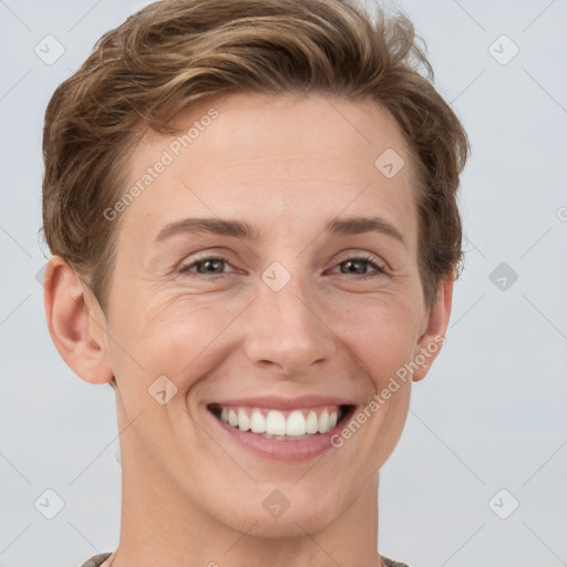 Joyful white young-adult female with short  brown hair and grey eyes