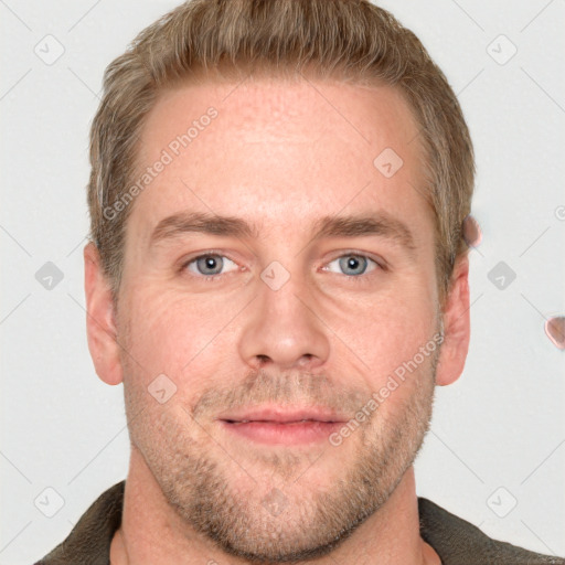 Joyful white adult male with short  brown hair and grey eyes