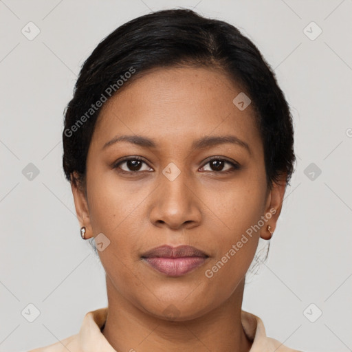 Joyful latino young-adult female with short  brown hair and brown eyes