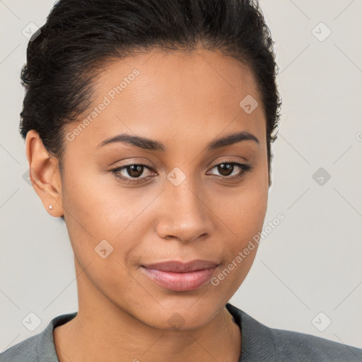 Joyful latino young-adult female with short  brown hair and brown eyes