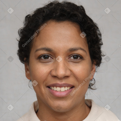 Joyful latino adult female with short  brown hair and brown eyes