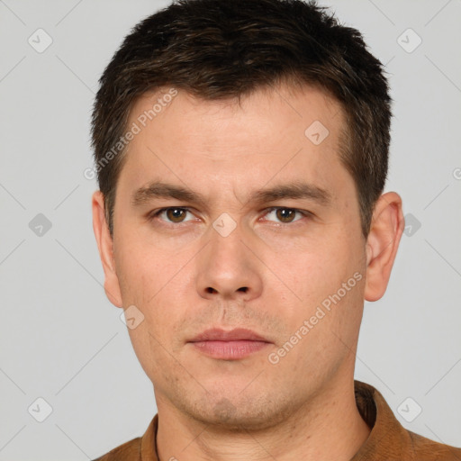 Neutral white young-adult male with short  brown hair and brown eyes