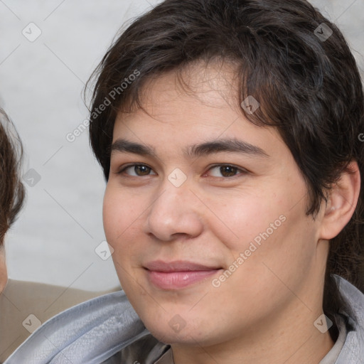 Joyful white young-adult male with medium  brown hair and brown eyes