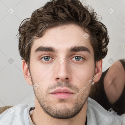 Neutral white young-adult male with short  brown hair and grey eyes