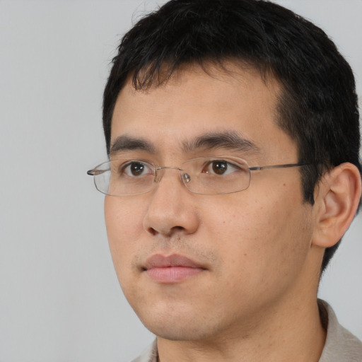 Neutral asian young-adult male with short  brown hair and brown eyes