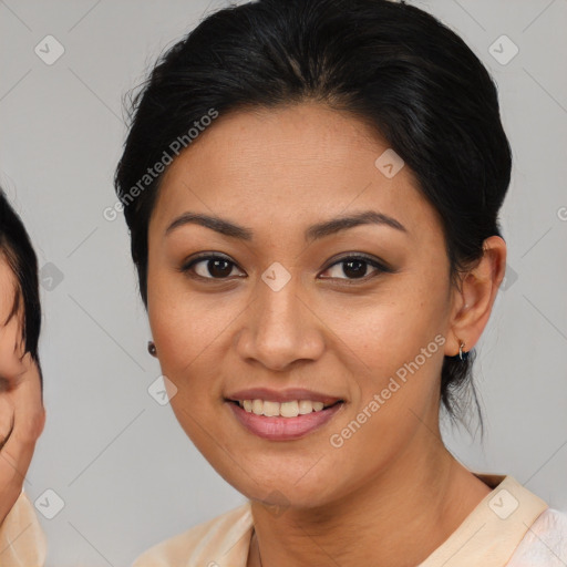 Joyful asian young-adult female with medium  brown hair and brown eyes