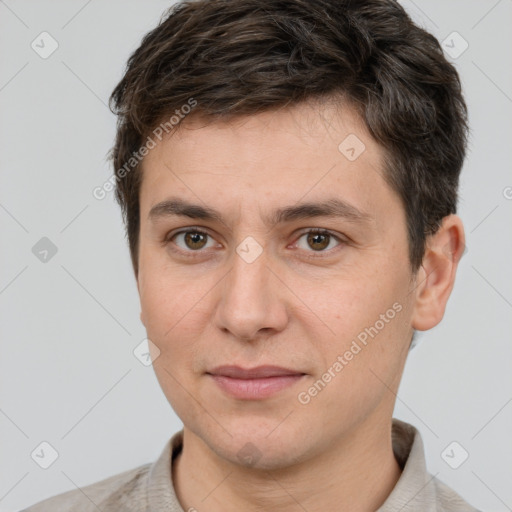 Joyful white young-adult male with short  brown hair and brown eyes