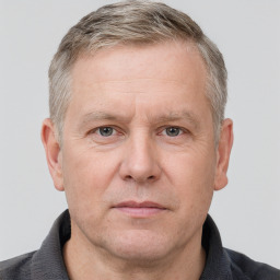 Neutral white adult male with short  brown hair and grey eyes