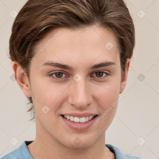 Joyful white young-adult female with short  brown hair and grey eyes