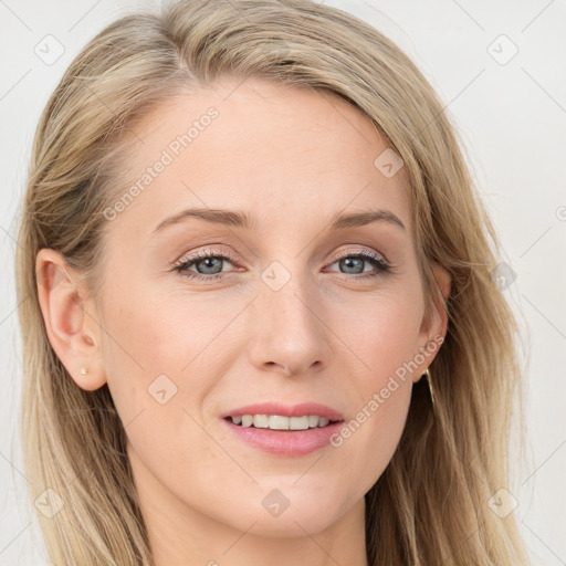 Joyful white young-adult female with long  brown hair and blue eyes