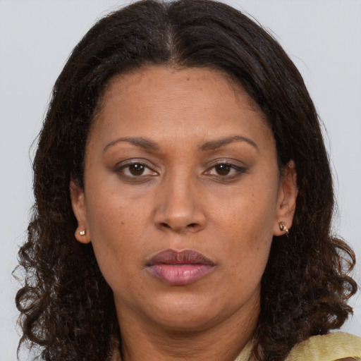 Neutral white adult female with medium  brown hair and brown eyes