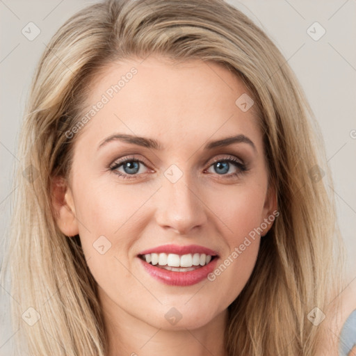 Joyful white young-adult female with long  brown hair and blue eyes