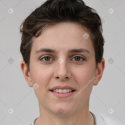 Joyful white young-adult female with short  brown hair and grey eyes