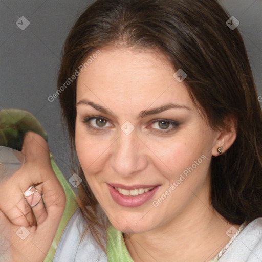 Joyful white young-adult female with medium  brown hair and brown eyes