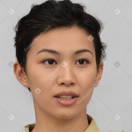 Joyful asian young-adult female with short  brown hair and brown eyes