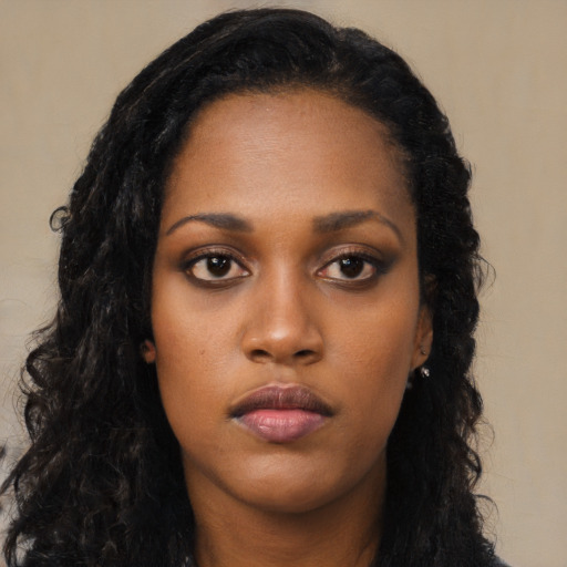 Neutral black young-adult female with long  black hair and brown eyes