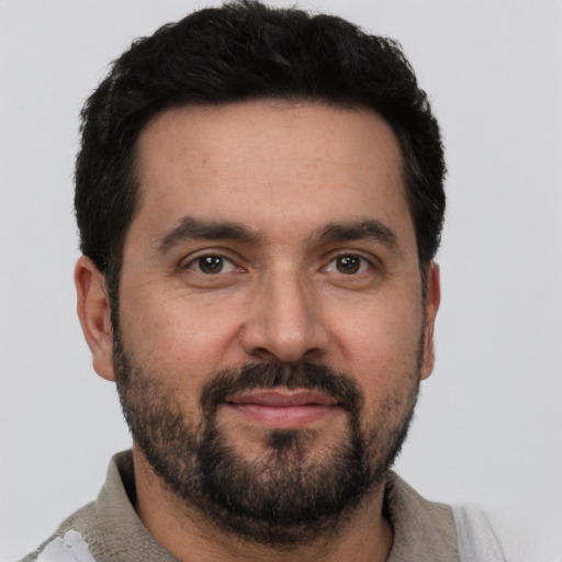 Neutral white young-adult male with short  black hair and brown eyes