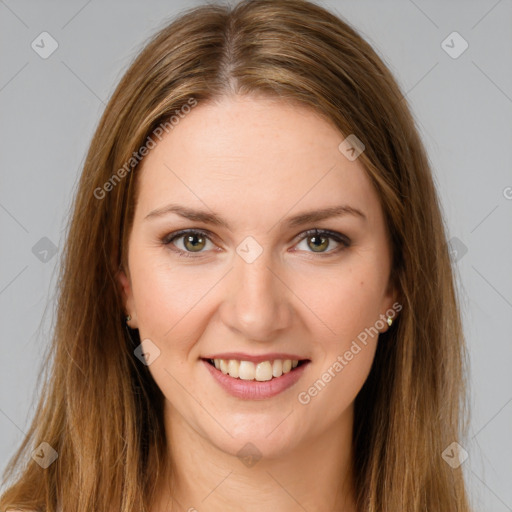 Joyful white young-adult female with long  brown hair and green eyes