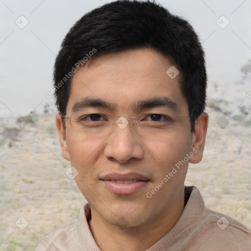 Joyful asian young-adult male with short  black hair and brown eyes