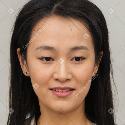 Joyful asian young-adult female with long  brown hair and brown eyes