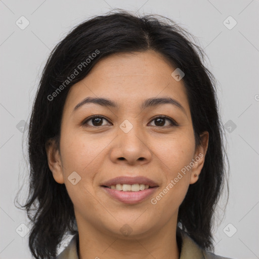 Joyful asian young-adult female with medium  brown hair and brown eyes