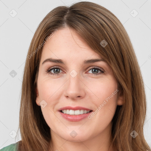 Joyful white young-adult female with medium  brown hair and green eyes