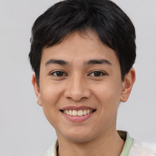 Joyful asian young-adult female with short  brown hair and brown eyes