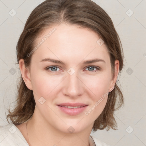 Joyful white young-adult female with medium  brown hair and blue eyes