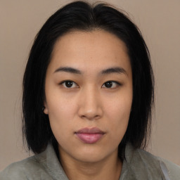 Neutral asian young-adult female with medium  black hair and brown eyes