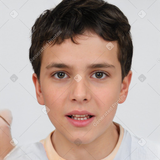 Joyful white child male with short  brown hair and brown eyes