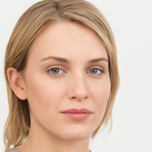 Neutral white young-adult female with medium  brown hair and grey eyes