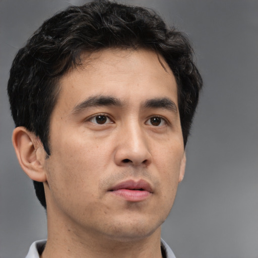 Neutral asian young-adult male with short  brown hair and brown eyes