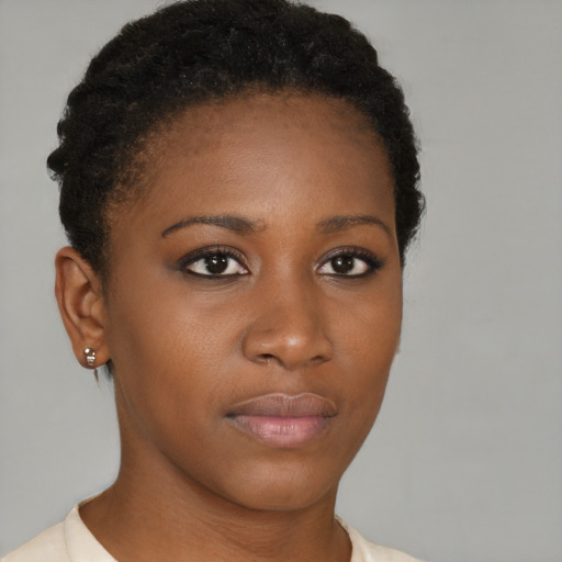 Neutral black young-adult female with short  brown hair and brown eyes