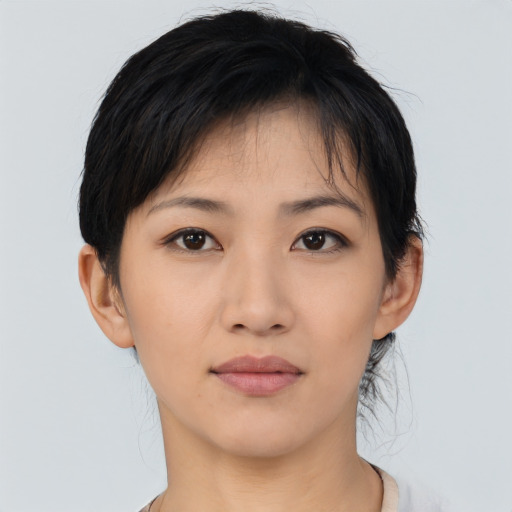 Neutral asian young-adult female with medium  black hair and brown eyes