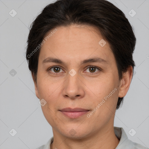 Joyful white adult female with short  brown hair and brown eyes